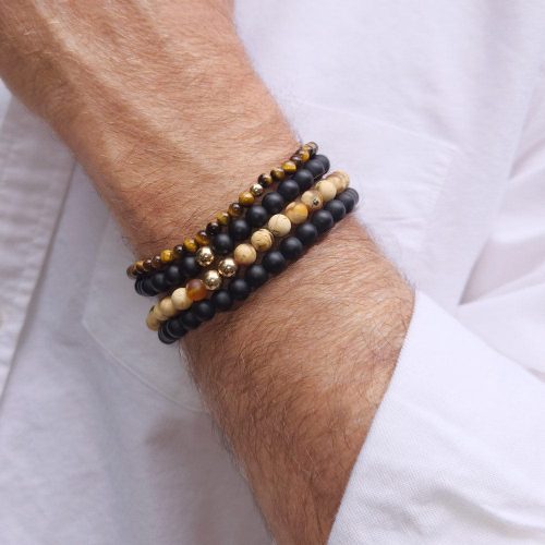 2 men s black onyx beaded bracelets stacked w 2 tiger s eye beaded bracelets white shirt wide