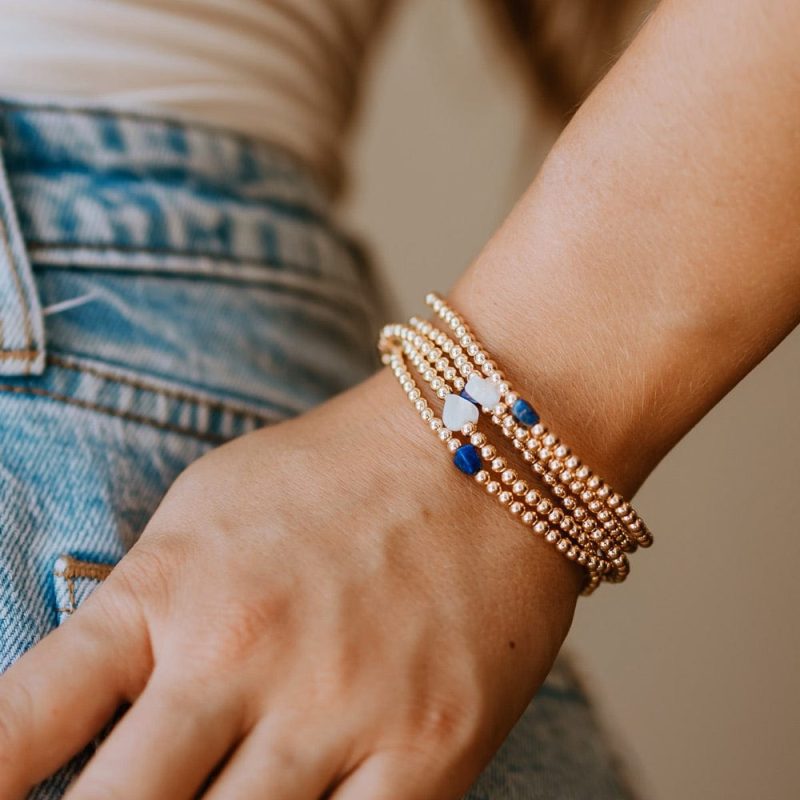 4mm 14k gold filled bracelets with pearl hearts and blue lapis hearts stacked denim