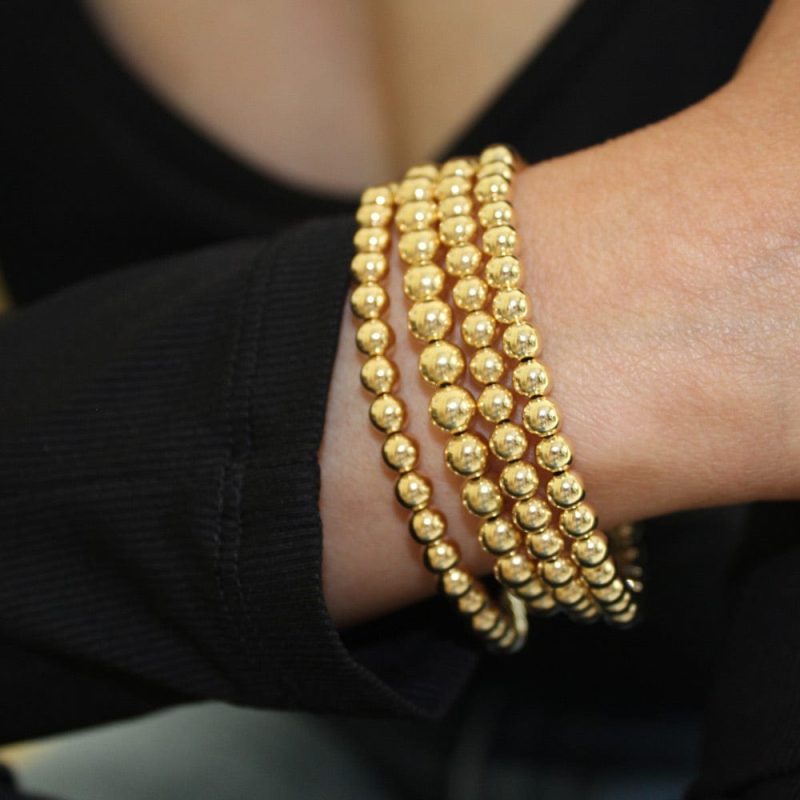 4mm and 6mm gold filled bracelets stack black shirt