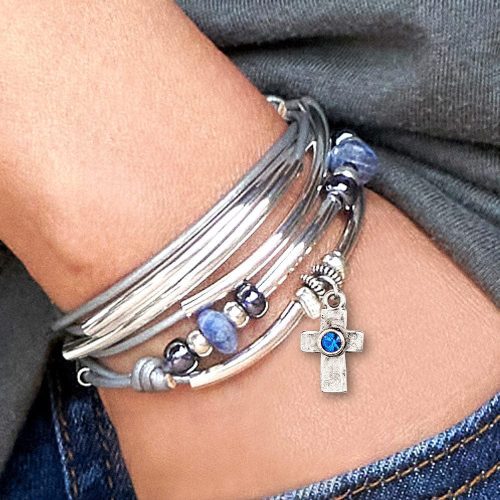 coastal calm silver and leather wrap bracelet with silver cross blue crystal charm denim neutral