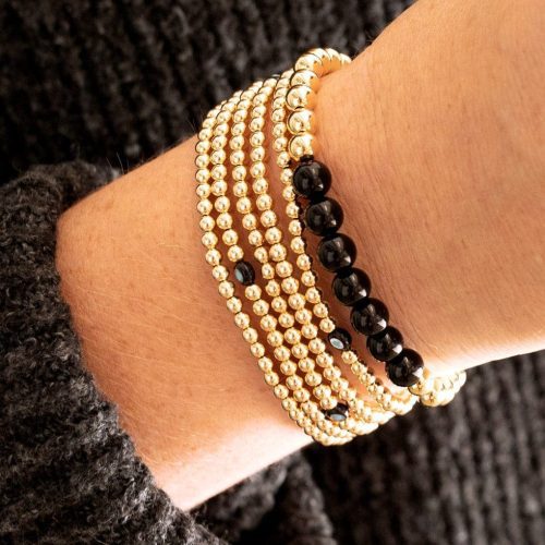 onyx and 14k gold bead stretch to fit bracelet stacked w 3mm 14k gold filled bracelets