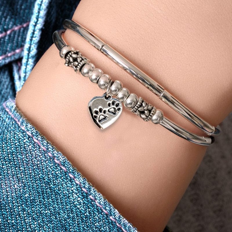 pancake silver and leather bracelet w sstainless steel paw print charm