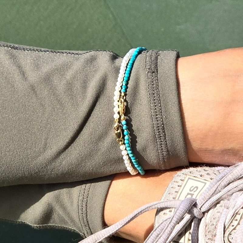 turquoise anklet and pearl anklet w 2mm gold beads stacked clasps shown outdoor summer neutral 76e86141 aeaa 4530 927c a61e655d562b